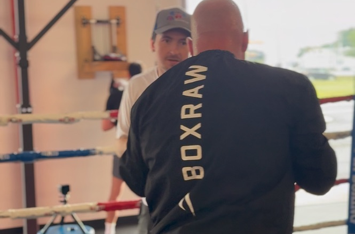Two members working in the ring with a coach at Fortivus